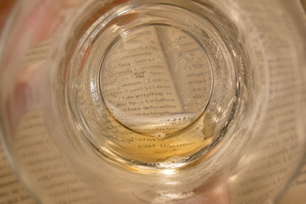 Beer glass on paper