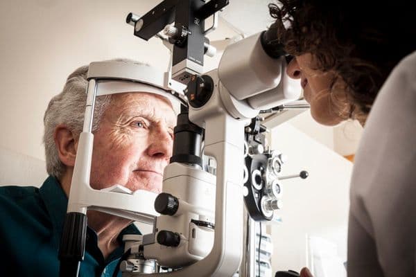 eye exam or scan on elderly man