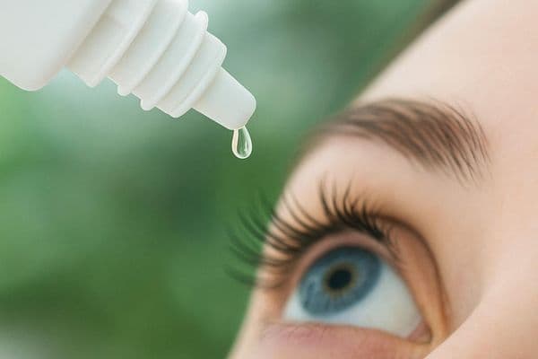 Lipid-containing eye drops effect on pre-CL tear film