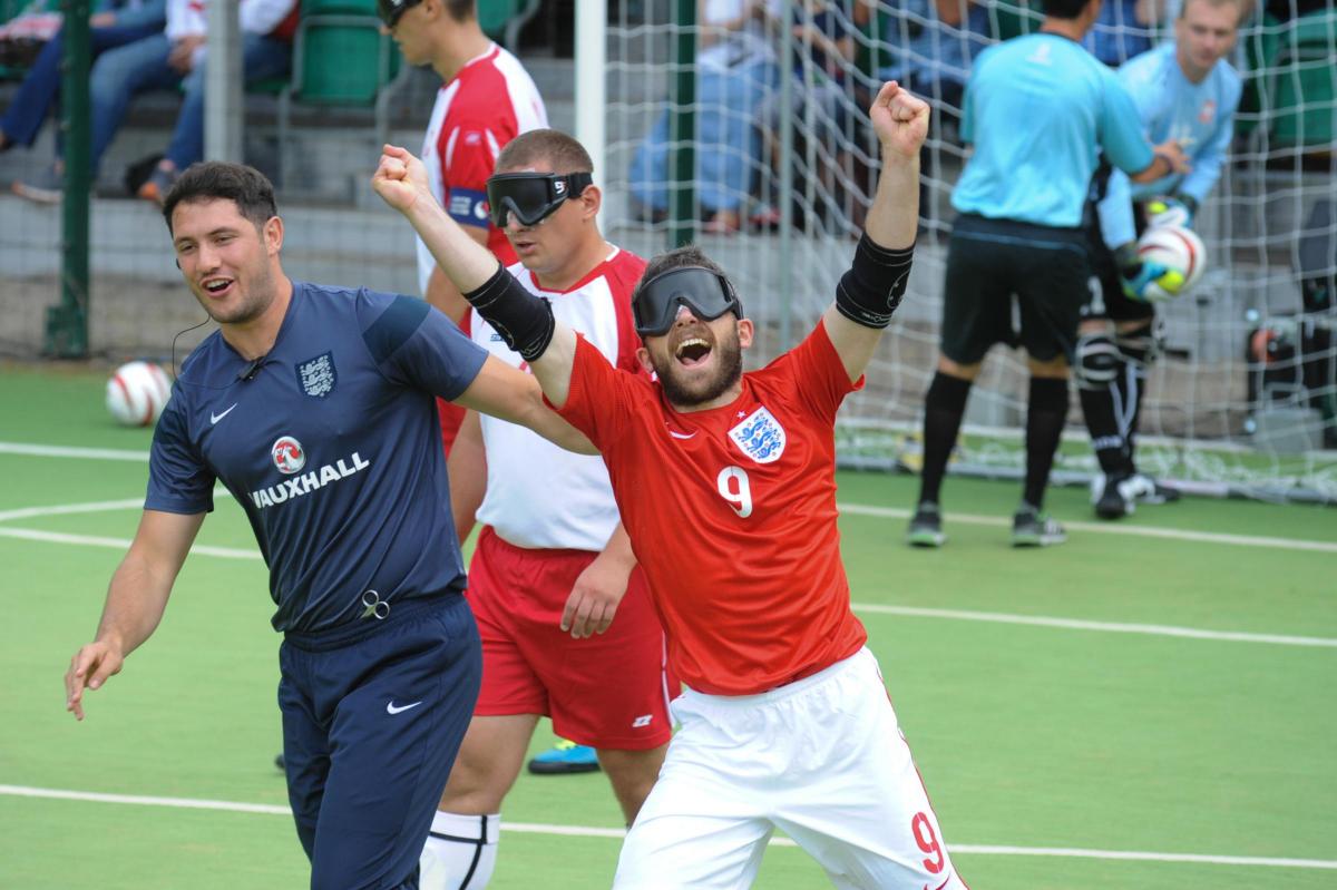 Blind footy goes global